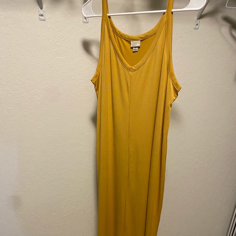 Mustard yellow, mid length, dress.